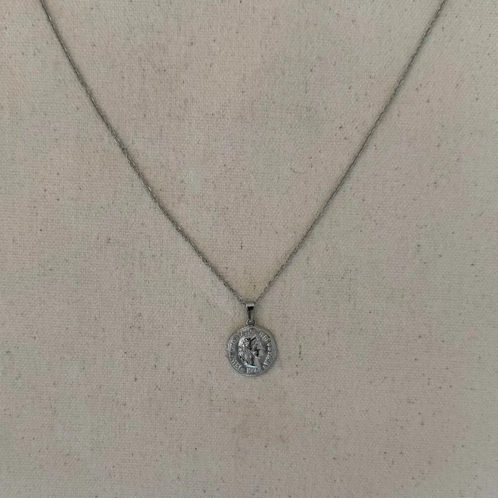 Y2k 2000s silver coin pendant